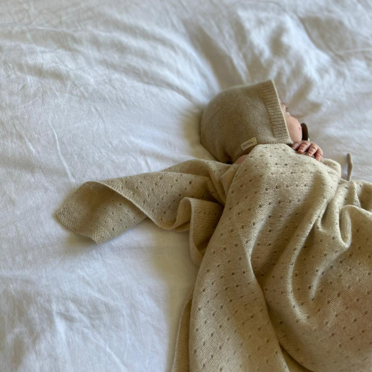 NEWBORN Premium Collection This is our most premium blanket, and if your looking for a special gift for a baby shower, this stunning unisex blanket should be top of your list. Incredibly soft and lightweight, made from 100% cashmere. This lovely hollow out design blanket is something to treasure and pass down the family in years to come. Comes in a white gift box 100% Cashmere designer cashmere baby blanket
