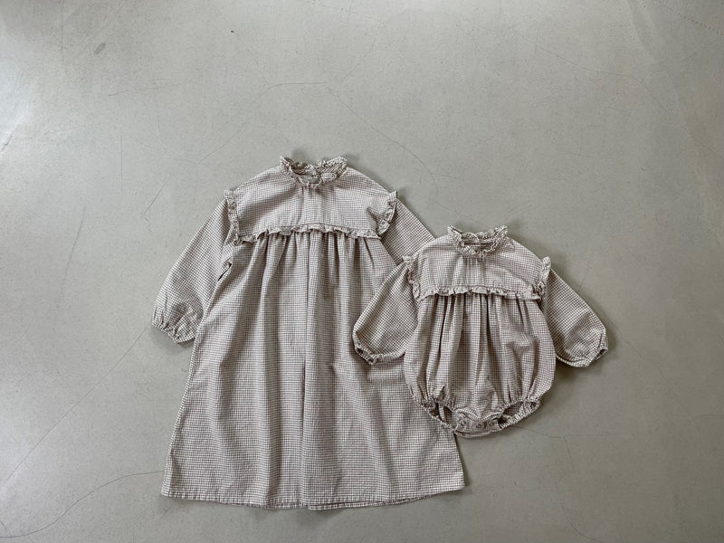 Colour - Check dark beige   Girls long, flowy A-Line dress featuring a beautiful high ruffled neckline design with the same ruffle flowing through the front section and top of arms.   Matching baby Rompers available