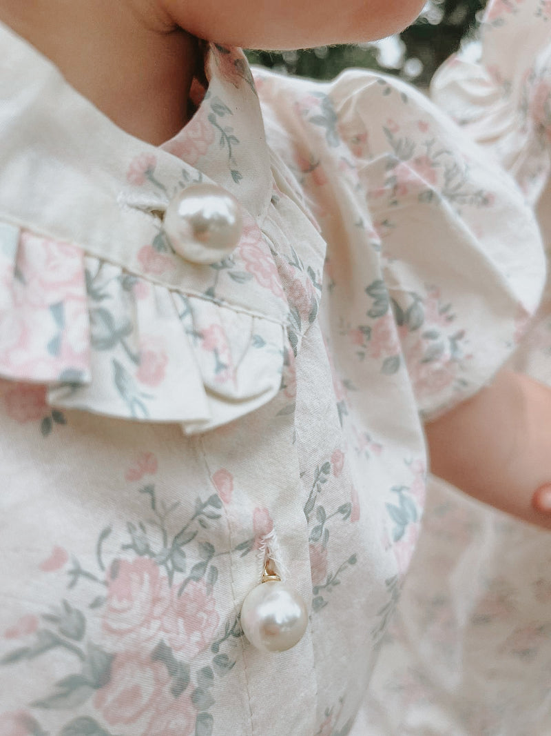 Colour: Floral  Featuring the Victorian-inspired vintage design and beautiful floral pattern with the most stunning pearl buttons down the centre of the blouse. The blouse and pants can coordinate together or still go beautifully matched with anything else.  - Cotton 100%